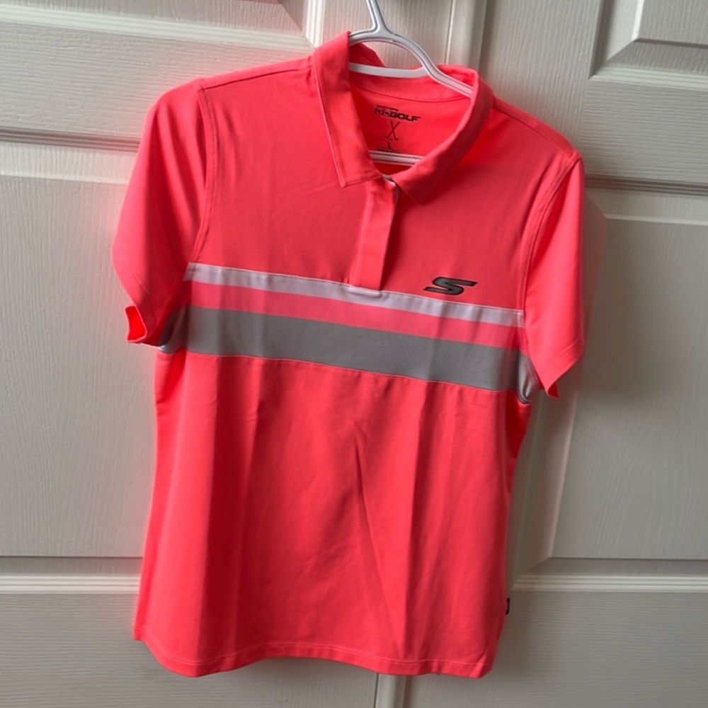 NWOT woman’s golf shirt